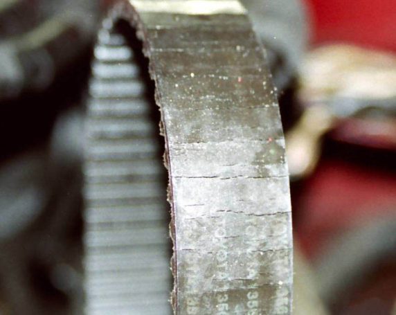 Timing belt with cracks
